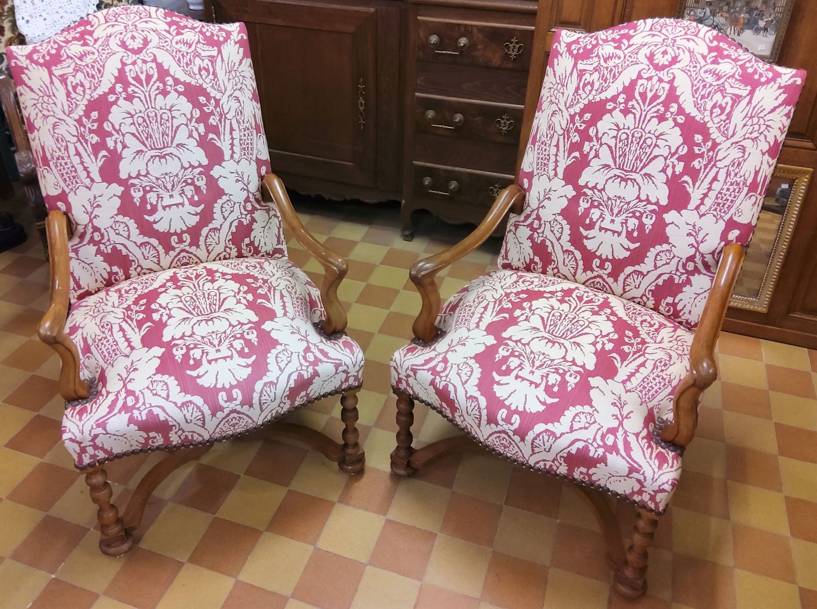 A pair of French Regence Armchairs